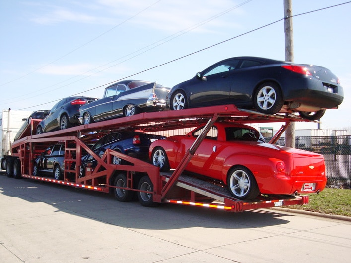 Car loaded for interstate vehicle transport